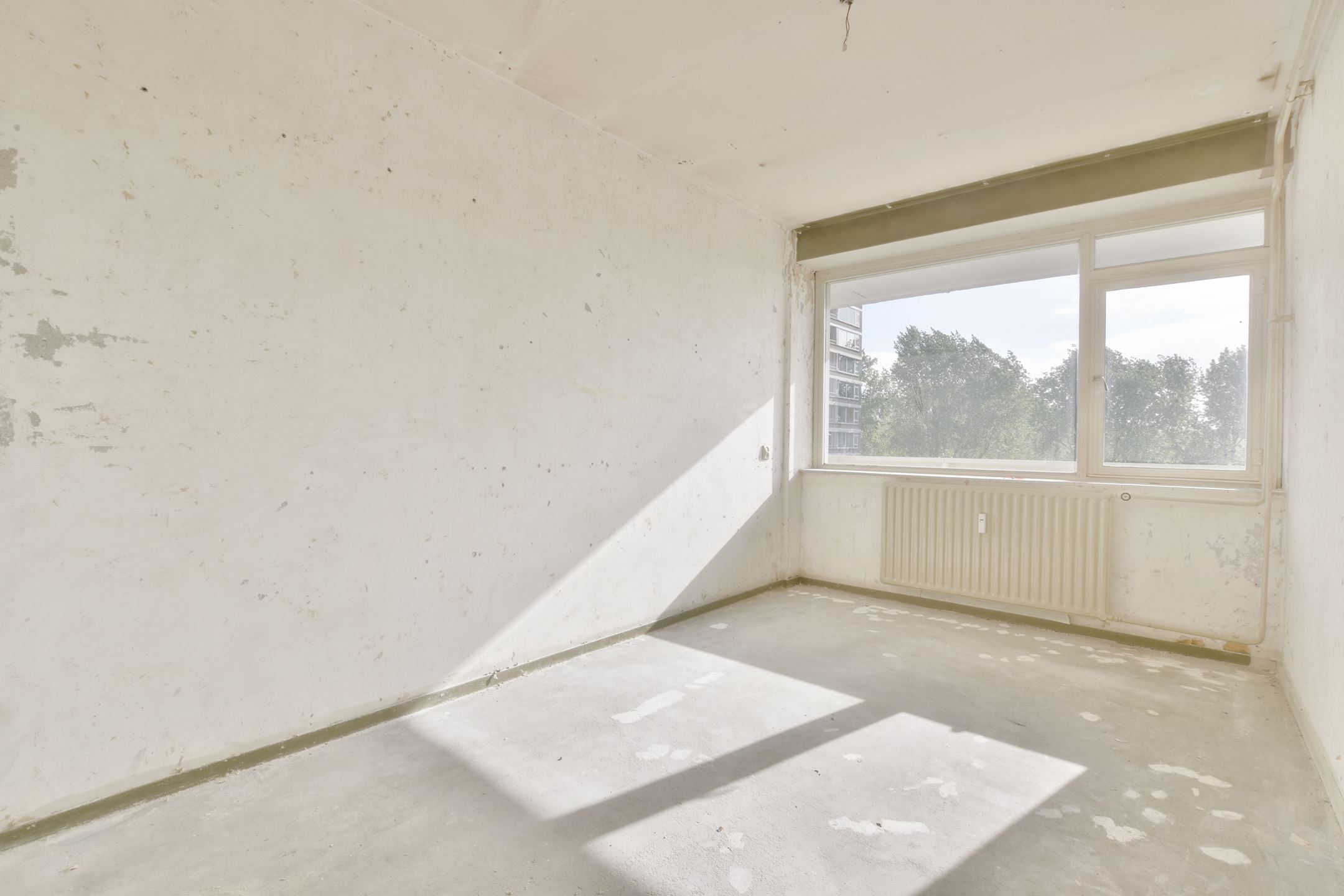 Bekijk Glad stucwerk wanden en plafonds volledige appartement Amsterdam foto 8