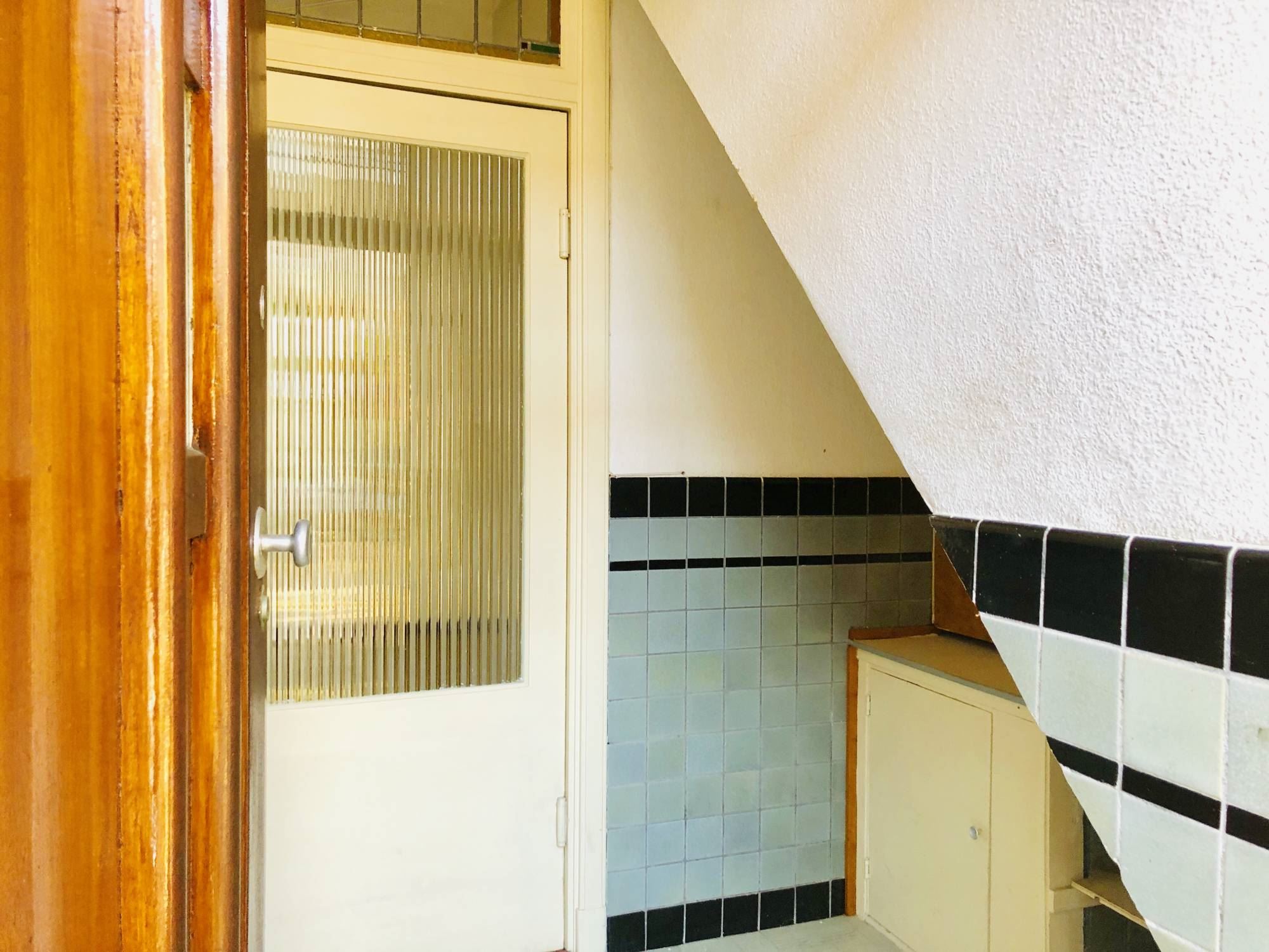 Glad stucwerk oude tussenwoning