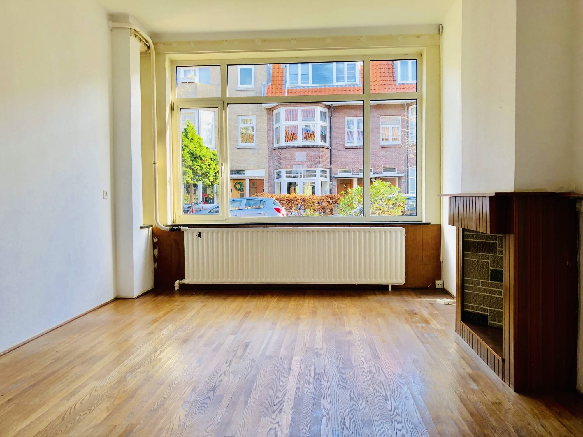 Bekijk Glad stucwerk oude tussenwoning foto 2