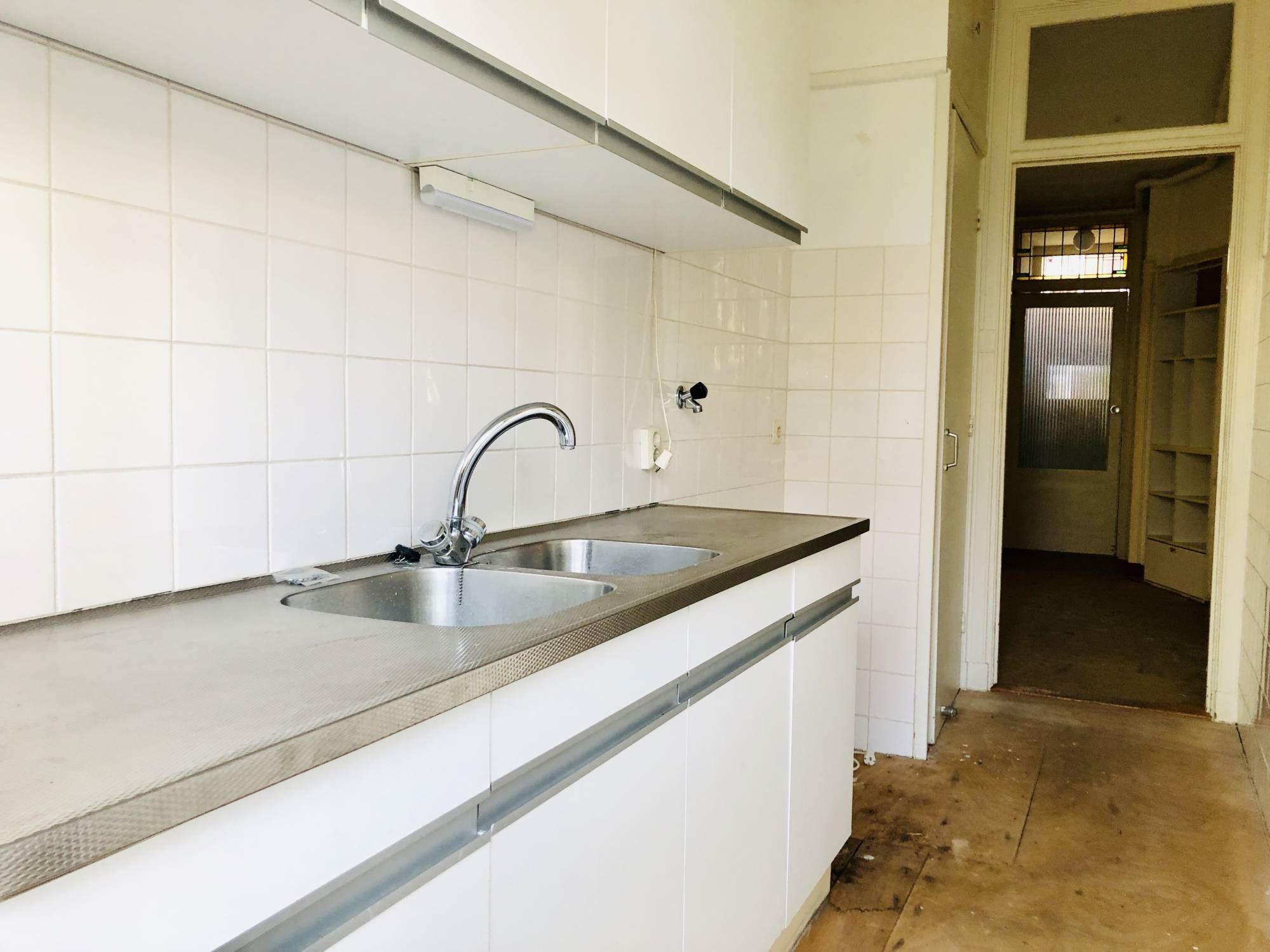 Bekijk Glad stucwerk oude tussenwoning foto 7