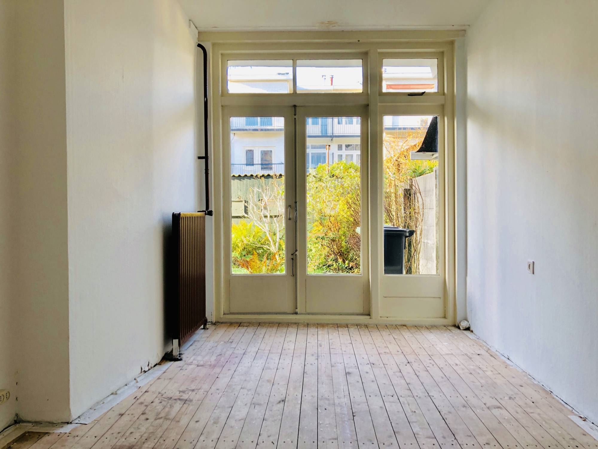Bekijk Glad stucwerk oude tussenwoning foto 8