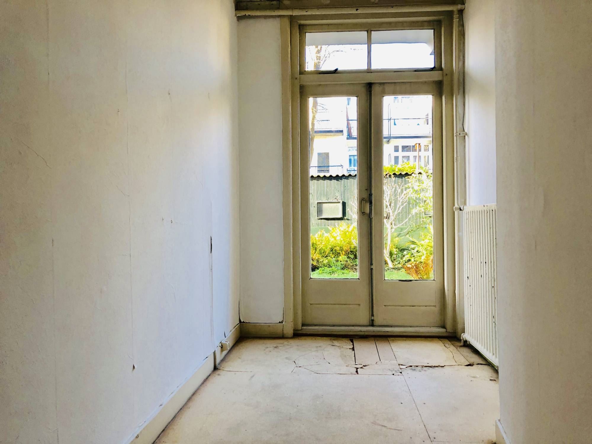 Bekijk Glad stucwerk oude tussenwoning foto 13