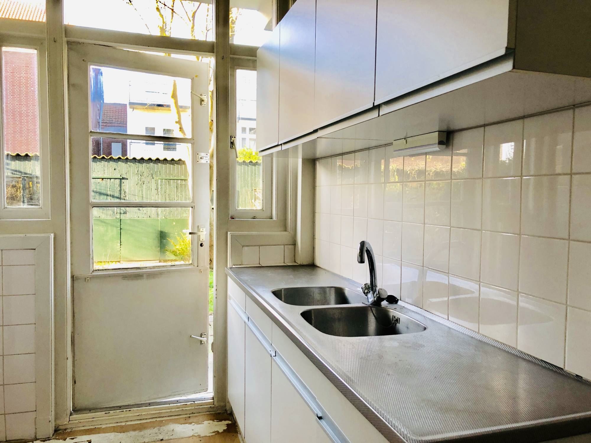 Bekijk Glad stucwerk oude tussenwoning foto 18
