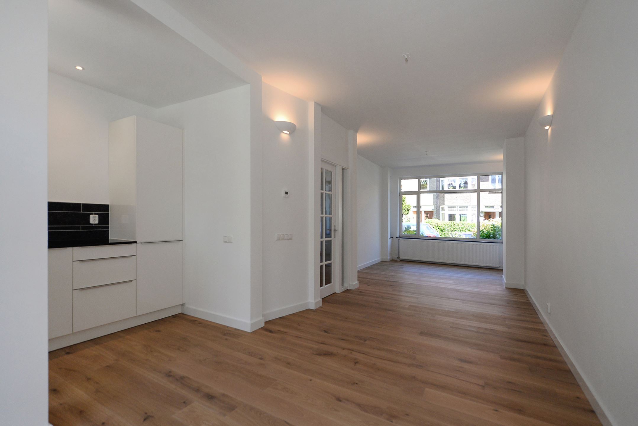 Bekijk Glad stucwerk oude tussenwoning foto 19