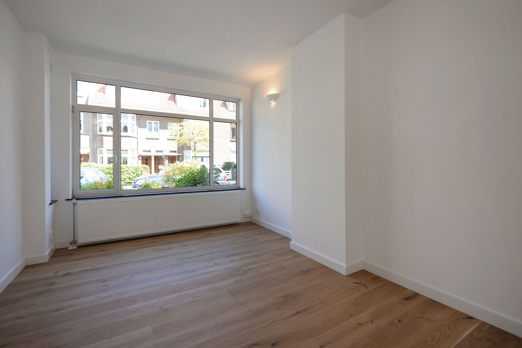 Bekijk Glad stucwerk oude tussenwoning foto 29
