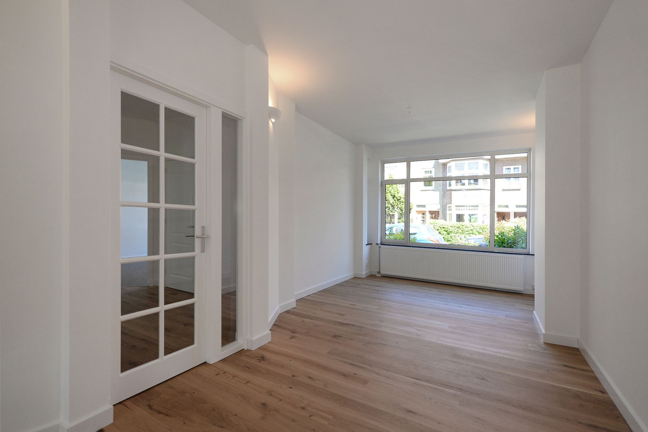 Bekijk Glad stucwerk oude tussenwoning foto 30