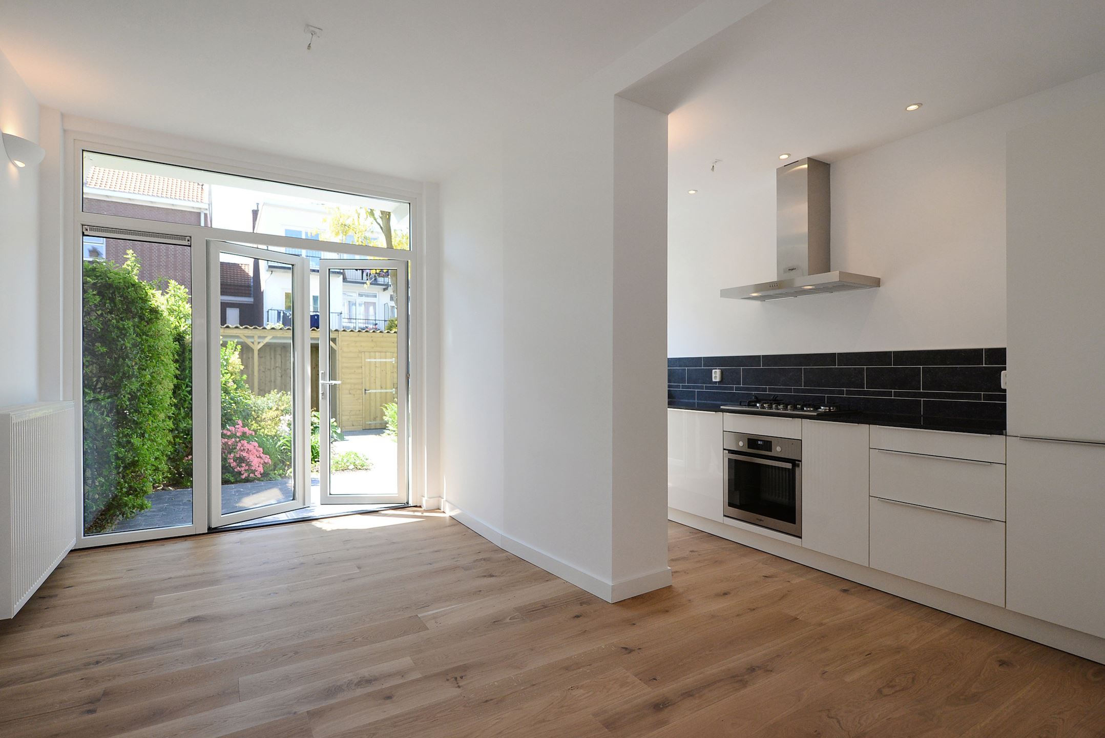 Bekijk Glad stucwerk oude tussenwoning foto 35